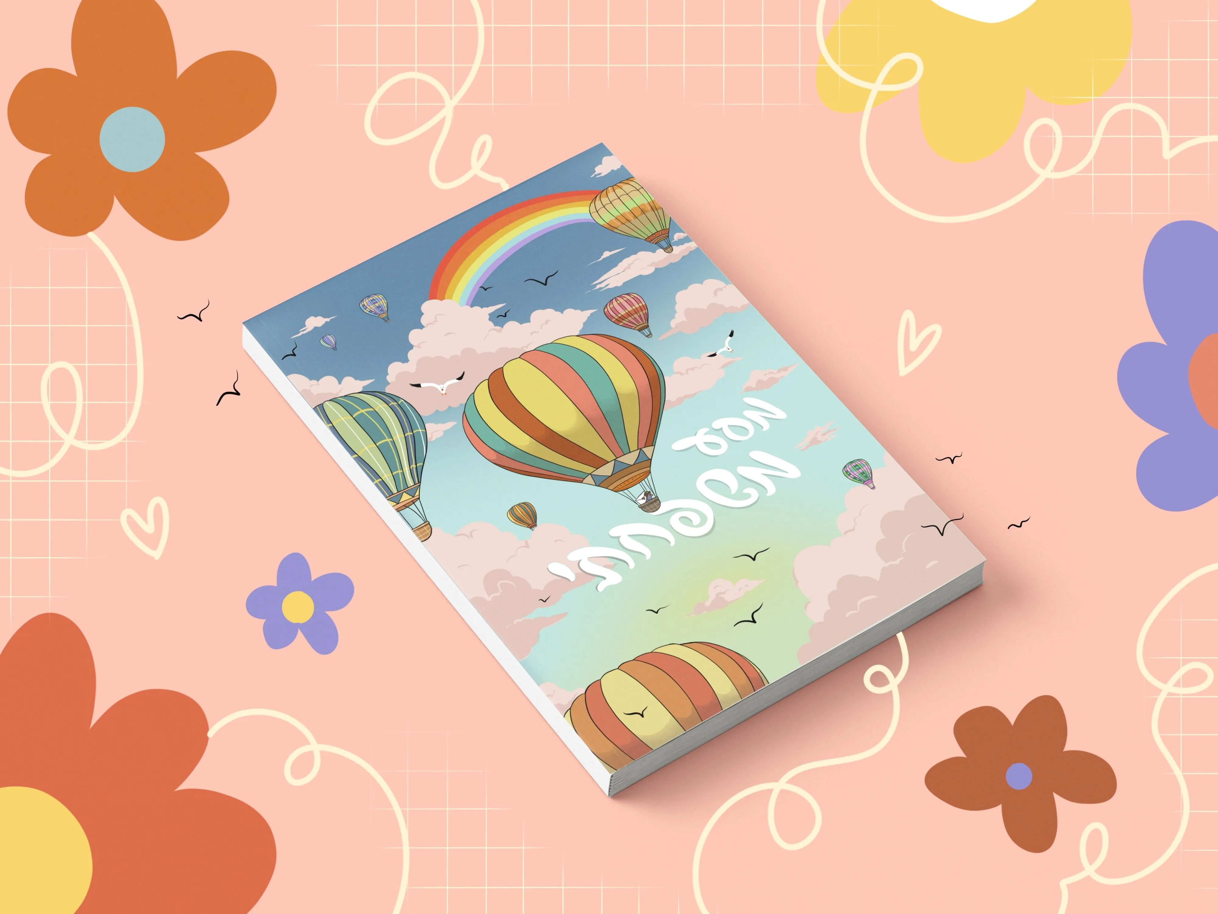 A travel journal notebook with a hot air balloon